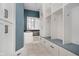 Convenient laundry room with built-in storage and a sink at 10295 Summerlin Way, Fishers, IN 46037
