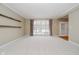 Spacious living room featuring hardwood floors and a view to backyard at 10295 Summerlin Way, Fishers, IN 46037