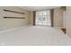 Bright living room with large windows and hardwood floors at 10295 Summerlin Way, Fishers, IN 46037