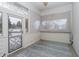 Bright sunroom with window and door leading to backyard at 10295 Summerlin Way, Fishers, IN 46037