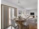Bright and airy living and dining area featuring stylish furnishings and modern decor at 11054 Dura Dr, Indianapolis, IN 46229