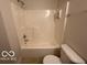 Full bathroom with a shower/tub combo and toilet at 11663 Congressional Ln, Indianapolis, IN 46235