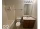 Bathroom featuring a shower/tub, toilet, vanity with sink, and vanity lighting at 11663 Congressional Ln, Indianapolis, IN 46235