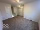 Bedroom with neutral carpet and neutral walls at 11663 Congressional Ln, Indianapolis, IN 46235