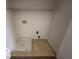 Laundry closet with a built in drain and shelving at 11663 Congressional Ln, Indianapolis, IN 46235