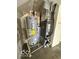 Image of a home's mechanical room, showing the water heater and HVAC unit at 11663 Congressional Ln, Indianapolis, IN 46235