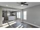 Spacious living room with hardwood floors and an open concept design at 1401 N Pershing Ave, Indianapolis, IN 46222