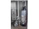 Utility closet with water heater and Carrier furnace at 1401 N Pershing Ave, Indianapolis, IN 46222