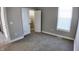 Simple bedroom with carpeted floor and a closet at 1407 N Pershing Ave, Indianapolis, IN 46222