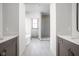 Modern bathroom with double vanity and walk-in shower at 17333 Ackerson Blvd, Westfield, IN 46074
