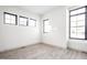 Bright bedroom with three windows and light hardwood floors at 17333 Ackerson Blvd, Westfield, IN 46074