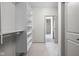Large walk-in closet with built-in shelves and rods at 17333 Ackerson Blvd, Westfield, IN 46074