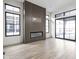 Living room with modern fireplace and patio access at 17333 Ackerson Blvd, Westfield, IN 46074