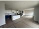 Bright, open kitchen features white cabinets and center island at 19983 Boulder Brook Ln, Westfield, IN 46074