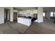 New kitchen with white cabinets and a center island under construction at 19983 Boulder Brook Ln, Westfield, IN 46074