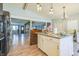 Kitchen with island and view into adjoining living area at 2003 S Bolton Ave, Indianapolis, IN 46203