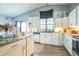 Bright kitchen with white cabinets and granite countertops at 2003 S Bolton Ave, Indianapolis, IN 46203