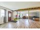 Living room with hardwood floors and exposed beams during remodel at 2003 S Bolton Ave, Indianapolis, IN 46203
