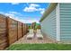 Relaxing backyard with lounge chairs and gravel garden at 2015 Columbia Ave, Indianapolis, IN 46202