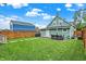 Backyard with patio, grill, and detached garage at 2015 Columbia Ave, Indianapolis, IN 46202