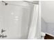Bathroom with white subway tile shower/tub combo and white vanity at 2015 Columbia Ave, Indianapolis, IN 46202