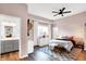 Spacious bedroom with en-suite bathroom and plenty of natural light at 2015 Columbia Ave, Indianapolis, IN 46202