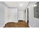 Bright entryway with neutral walls and wood flooring at 2015 Columbia Ave, Indianapolis, IN 46202