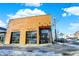 Wood-sided building with garage doors and outdoor lighting at 2015 Columbia Ave, Indianapolis, IN 46202