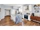 Modern kitchen with white cabinets, granite island, and stainless steel appliances at 2015 Columbia Ave, Indianapolis, IN 46202