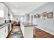 Open concept kitchen with island and stainless steel appliances at 2015 Columbia Ave, Indianapolis, IN 46202