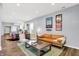 Open living room and kitchen with hardwood floors and modern decor at 2015 Columbia Ave, Indianapolis, IN 46202