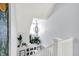 Bright, open staircase with unique lighting fixture at 2015 Columbia Ave, Indianapolis, IN 46202
