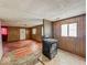View of kitchen with appliances and wood flooring at 216 W 27Th St, Anderson, IN 46016