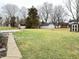 Large backyard with patio, shed, and mature trees at 2526 Pleasant W Way, Carmel, IN 46280