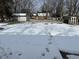 Snowy backyard with shed and detached garage at 2526 Pleasant W Way, Carmel, IN 46280