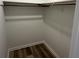 Empty closet with wood laminate flooring at 2526 Pleasant W Way, Carmel, IN 46280