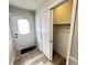 Front entry with coat closet and wood-look floors at 2526 Pleasant W Way, Carmel, IN 46280