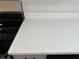Close-up view of the kitchen's quartz countertop at 2526 Pleasant W Way, Carmel, IN 46280