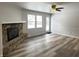 Spacious living room with stone fireplace and hardwood floors at 2526 Pleasant W Way, Carmel, IN 46280