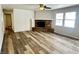 Spacious living room with stone fireplace and hardwood floors at 2526 Pleasant W Way, Carmel, IN 46280
