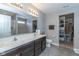 Bathroom with double vanity and walk-in closet at 4046 Stubbington Ln, Indianapolis, IN 46239