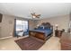 Spacious bedroom with a king-size bed and sitting area at 4046 Stubbington Ln, Indianapolis, IN 46239