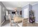 Dining area with light wood table and chairs, near kitchen at 4046 Stubbington Ln, Indianapolis, IN 46239