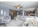 Open-concept living room with sectional sofa and view of kitchen at 4046 Stubbington Ln, Indianapolis, IN 46239