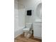 Clean and modern bathroom with white vanity and shower/tub at 4233 Evanston Ave, Indianapolis, IN 46205