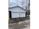 Two-car garage with white doors and dark gray accents at 448 N Gray St, Indianapolis, IN 46201