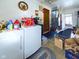 Unfinished laundry room with washer, dryer, and storage at 4712 Southern Ave, Anderson, IN 46013