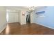 Dining room with hardwood floors and a view to the kitchen at 5060 Hawthorne Way # 11, Avon, IN 46123