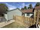 An exterior view of a cozy townhouse with a private fence showcasing an inviting outdoor space at 5060 Hawthorne Way # 11, Avon, IN 46123