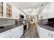 Modern kitchen with white cabinets and gray countertops at 5060 Hawthorne Way # 11, Avon, IN 46123